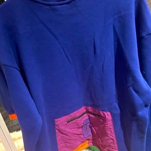 Men long sleeve sweater with a zip pocket at the back.